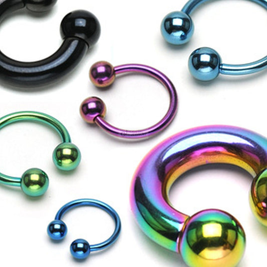 Piercing Hufeisenring mit Kugeln aus Chirurgenstahl mit Titan beschichtet - Cristal-Jewelry